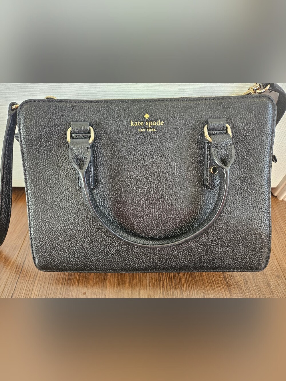kate spade black pebbled leather satchel with gold accents